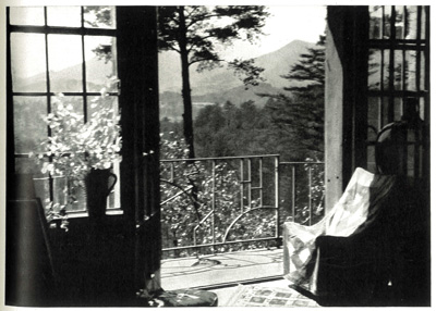 View of iron railing and mountain views seen from Ellertson's third floor studio
