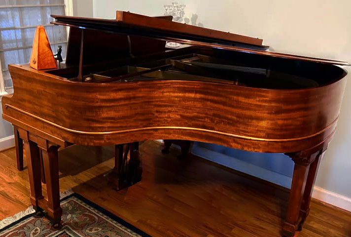 Photo of piano highligting color and leg structure