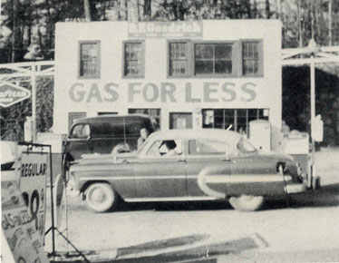 Gas For Less and car in front