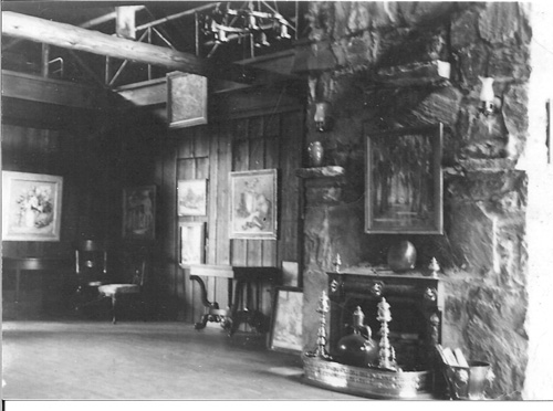 Old photo of Rock House fireplace and artwork
